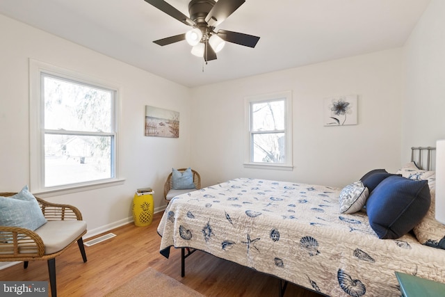 bedroom featuring ceiling fan and light hardwood / wood-style floors