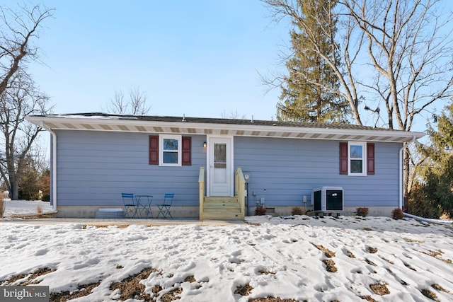 view of front of property with cooling unit