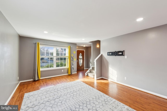 entryway with light hardwood / wood-style floors