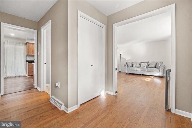 hall featuring light hardwood / wood-style floors