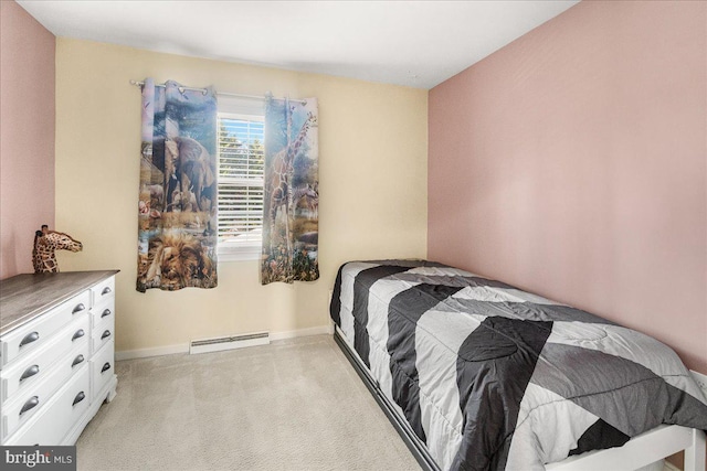 bedroom with light carpet and a baseboard radiator