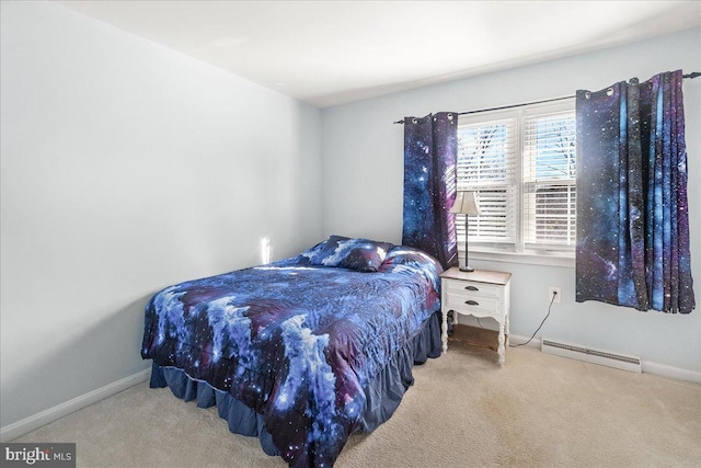 carpeted bedroom with a baseboard heating unit