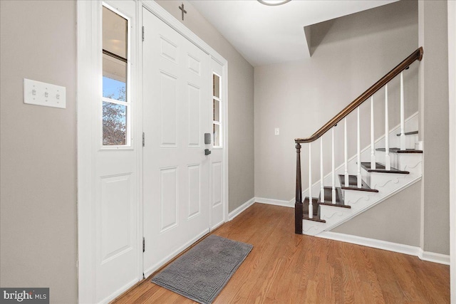 foyer entrance featuring hardwood / wood-style flooring