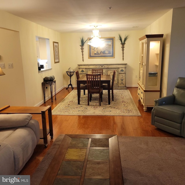 dining area with dark wood-type flooring