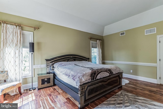 bedroom featuring hardwood / wood-style flooring