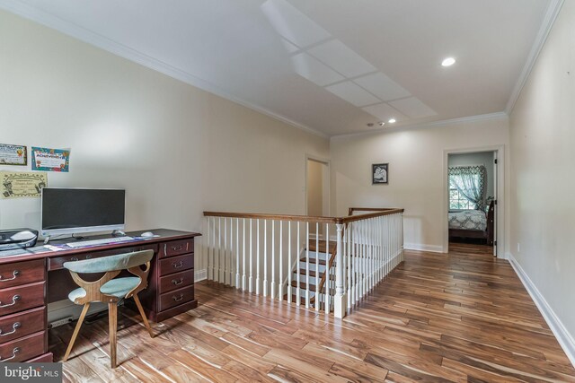 office featuring hardwood / wood-style flooring and ornamental molding