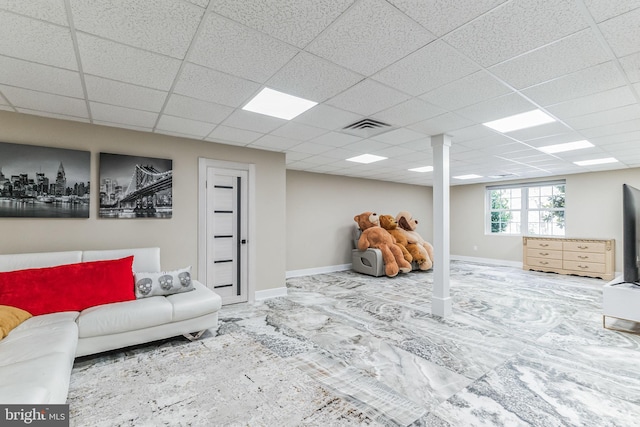 living room with a paneled ceiling