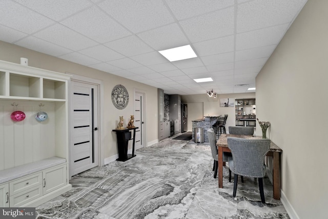 home office featuring a drop ceiling