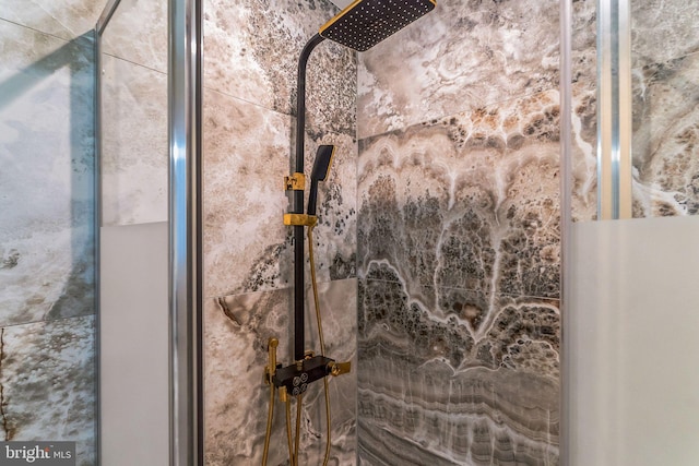 interior space with a tile shower