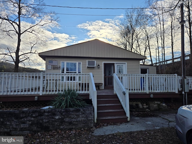 view of front of house featuring a deck