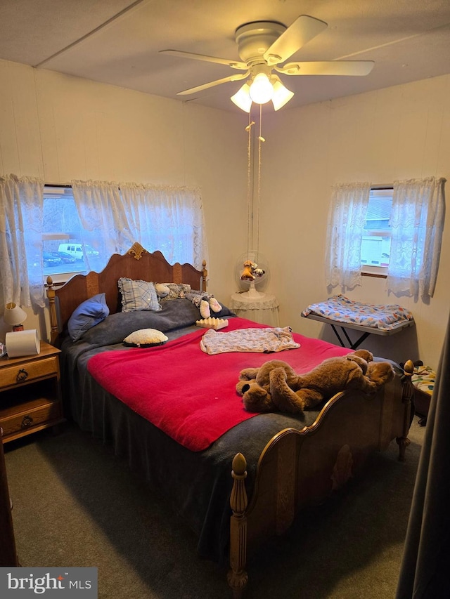 bedroom with carpet flooring and ceiling fan