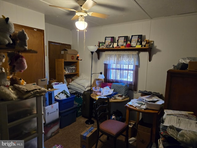 carpeted home office with ceiling fan