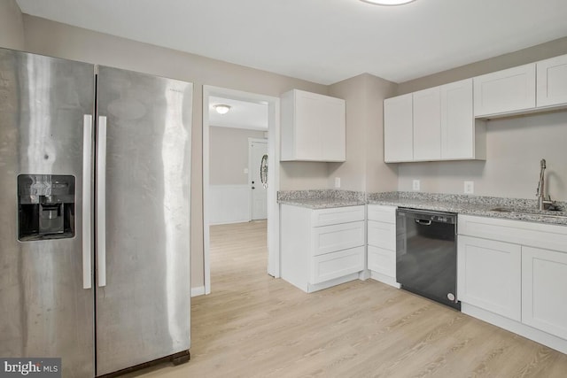 kitchen featuring stainless steel refrigerator with ice dispenser, sink, light hardwood / wood-style flooring, dishwasher, and white cabinetry