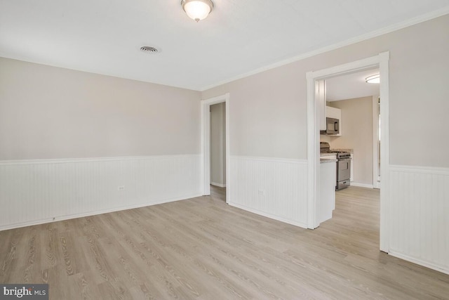 empty room with light wood-type flooring