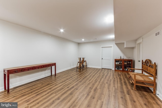 living area featuring hardwood / wood-style flooring