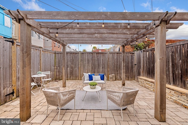 view of patio / terrace featuring an outdoor living space and a pergola