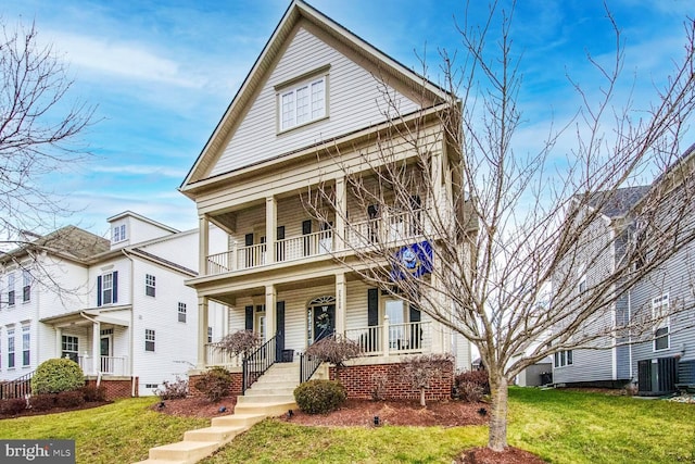 view of front of house featuring a porch, a front lawn, and cooling unit