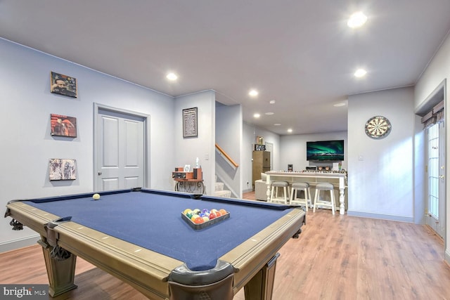 recreation room featuring bar, wood-type flooring, and billiards