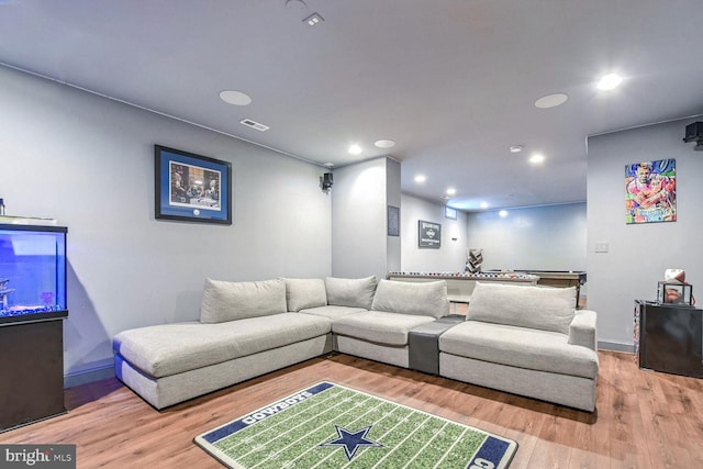 living room with hardwood / wood-style flooring