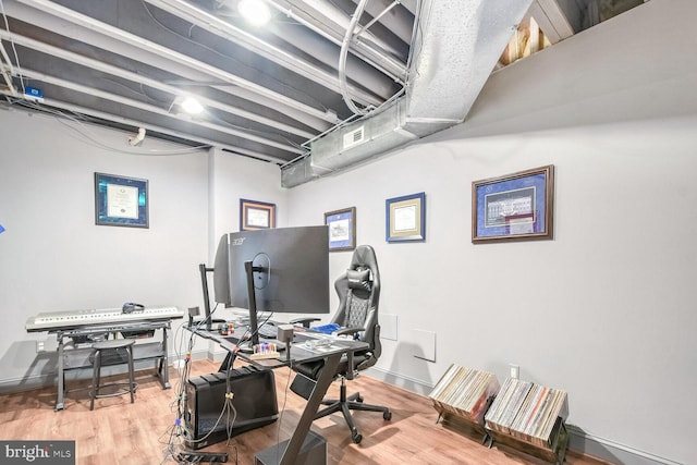 office with hardwood / wood-style floors