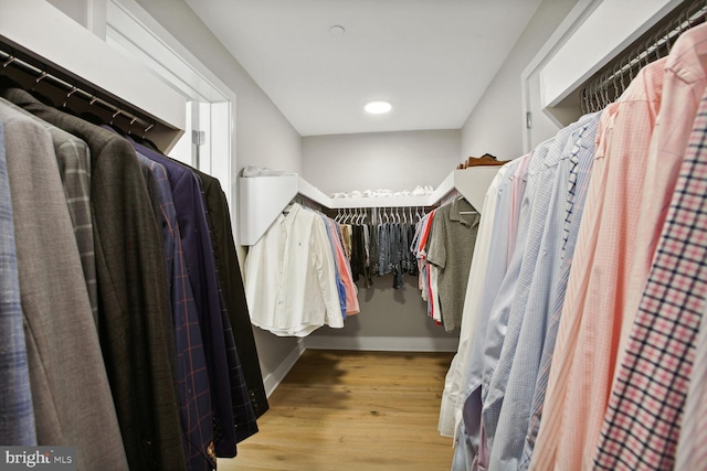 walk in closet featuring light wood-type flooring