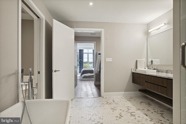 bathroom featuring tile patterned floors and vanity