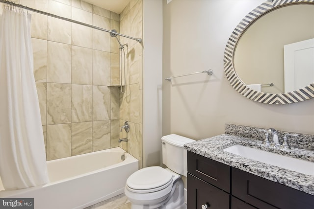 full bath featuring vanity, shower / tub combo, and toilet