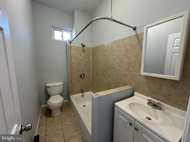 full bathroom featuring tile patterned floors, vanity, toilet, and shower / tub combination