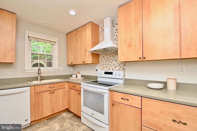 kitchen featuring tasteful backsplash, wall chimney exhaust hood, white appliances, sink, and light brown cabinets