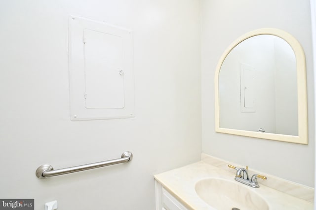 bathroom with vanity and electric panel