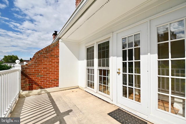 balcony featuring french doors