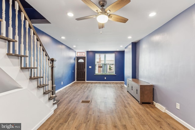 entrance foyer featuring ceiling fan and light wood-type flooring