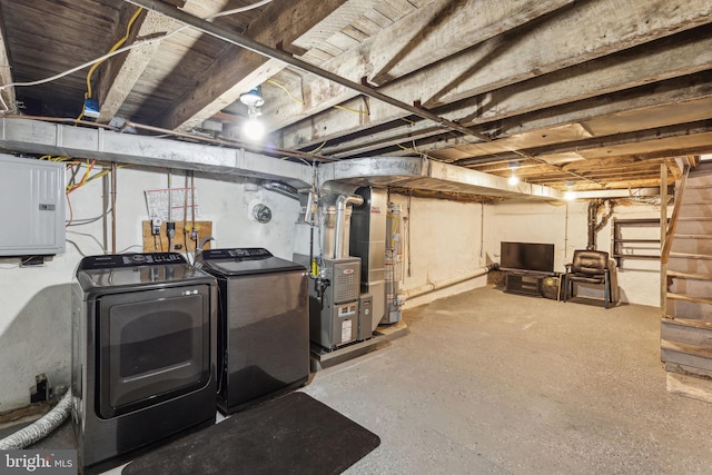 basement with washer and dryer and electric panel