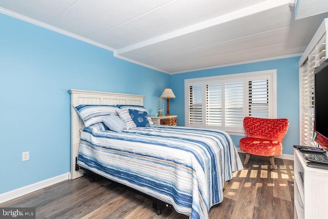 bedroom with crown molding and dark wood-type flooring