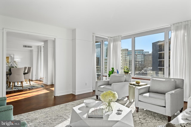 living room with dark parquet floors