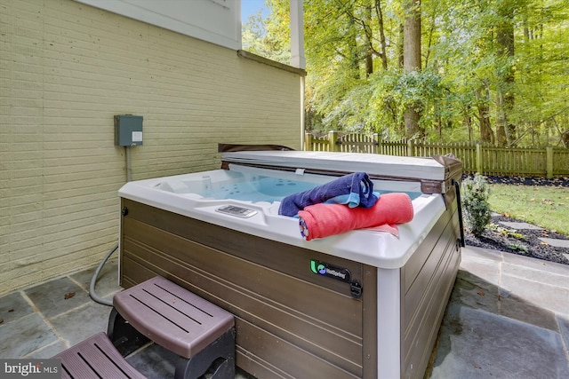 view of patio with a hot tub