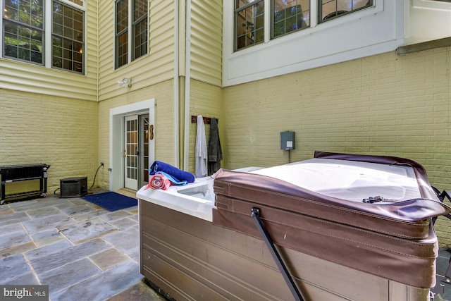 view of patio featuring a hot tub