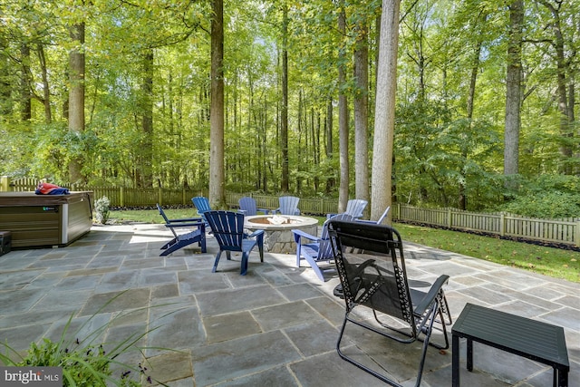 view of patio / terrace featuring an outdoor fire pit