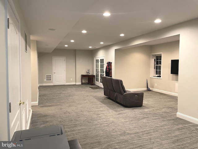 interior space featuring dark colored carpet