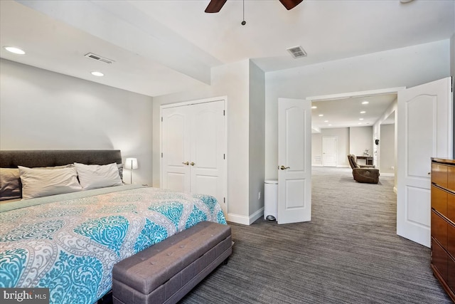 bedroom with ceiling fan, a closet, and dark carpet