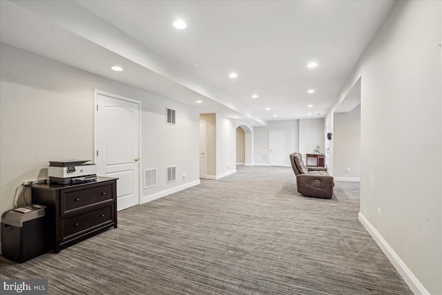 sitting room featuring carpet