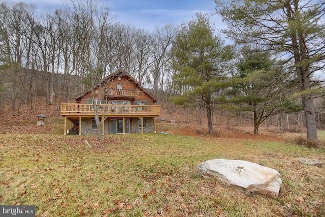 view of yard with a wooden deck