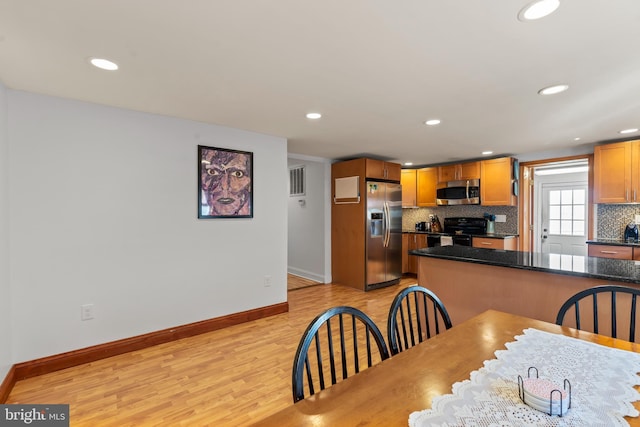 dining room featuring light hardwood / wood-style flooring