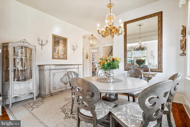 dining room with a notable chandelier