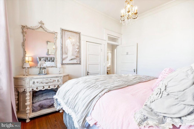 bedroom featuring a notable chandelier, dark hardwood / wood-style flooring, and crown molding