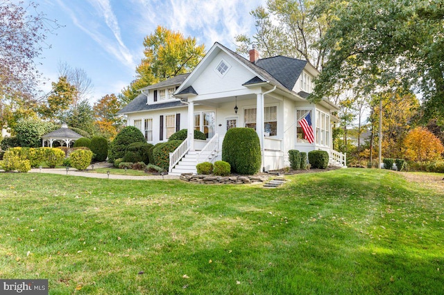 view of front of property with a front lawn