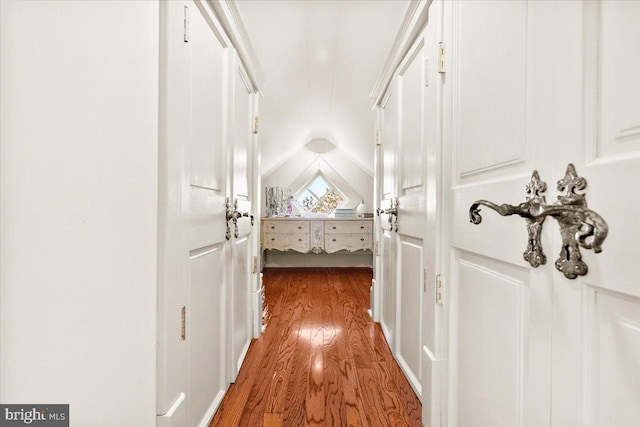 hall with hardwood / wood-style flooring