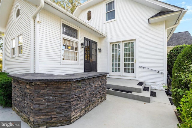 exterior space featuring a patio and french doors