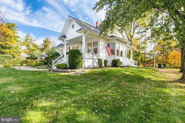 view of property exterior with a yard