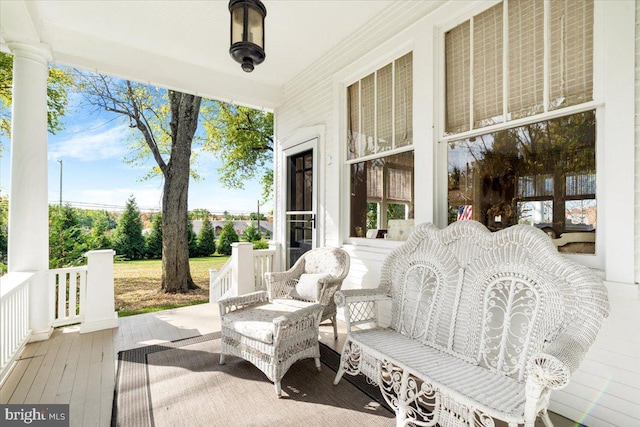 view of patio featuring a porch